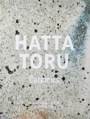 A book cover titled 'HATTA TORU Ceramics' in large white sans-serif text over a close-up textured ceramic surface with speckled gray, beige, and blue tones.