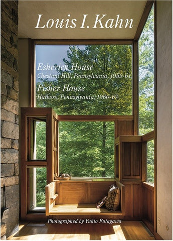 Interior of a modern house with large windows overlooking trees, featuring text about Louis I. Kahn's Esherick House and Fisher House.