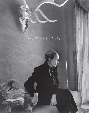 Georgia O'Keeffe: In New Light book cover with black and white portrait of the artist.