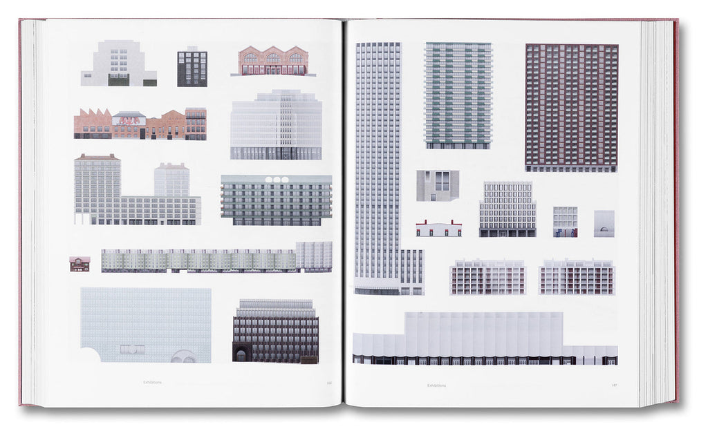 Open book showing illustrations of buildings on a white background