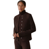 A woman modeling a dark brown ribbed knit turtleneck cardigan with white buttons over a matching brown turtleneck sweater and matching ribbed pants, set against a plain white background.