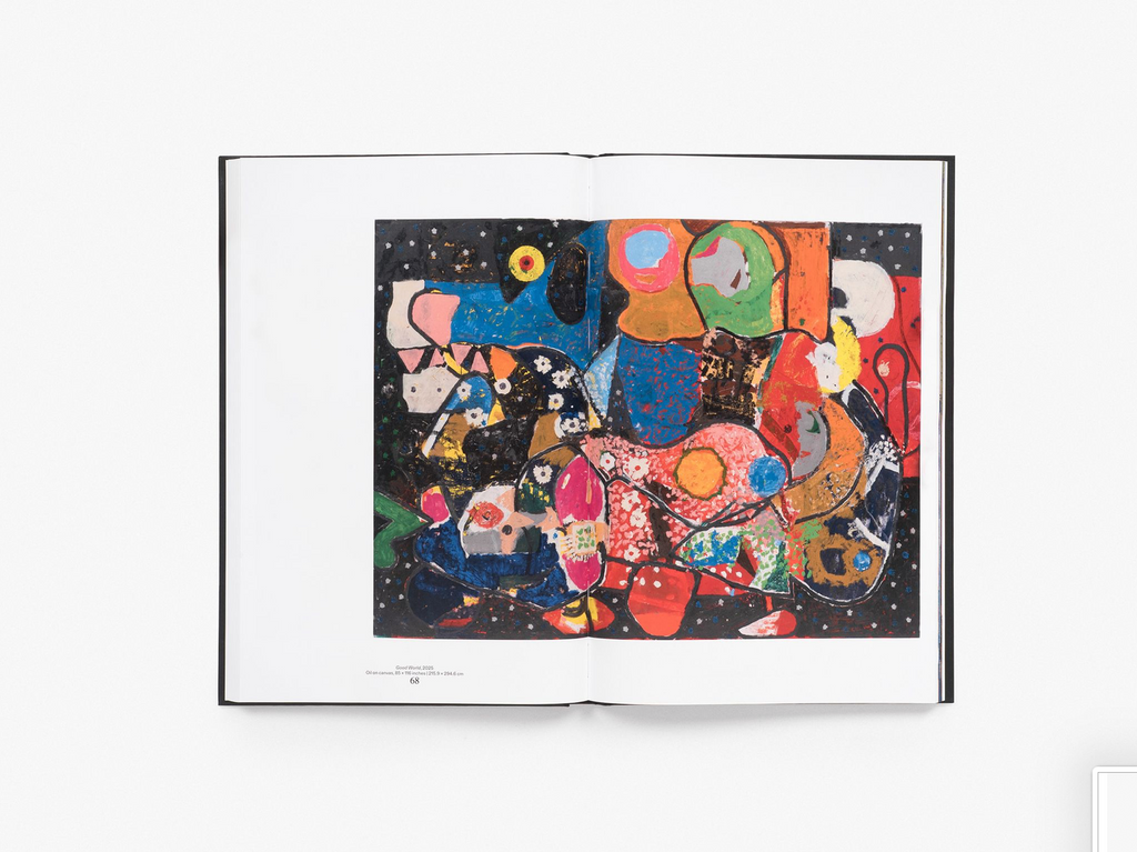 An open art book showcasing a vibrant abstract painting by Joe Bradley across a two-page spread, featuring bold blocks of green, orange, blue, and yellow with graphic shapes and lines, displayed flat against a white background.
