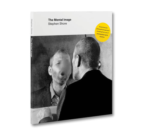 The cover features a black-and-white photograph of a man looking into a mirror, where his reflection appears distorted and blurred. A bright yellow circular sticker in the top right corner reads, "A practical and philosophical approach to seeing from one of photography's great teachers."