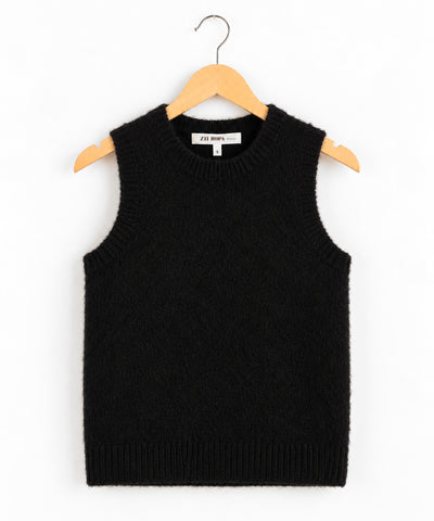 Zii Ropa black fuzzy knit sweater vest hanging on a wooden hanger. The sleeveless top features a crew neckline and ribbed trim at the collar, armholes, and hem.