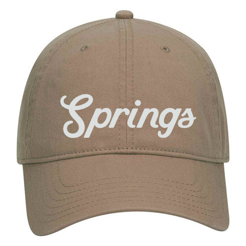 Tan baseball cap featuring the word Springs in white script font across the front.