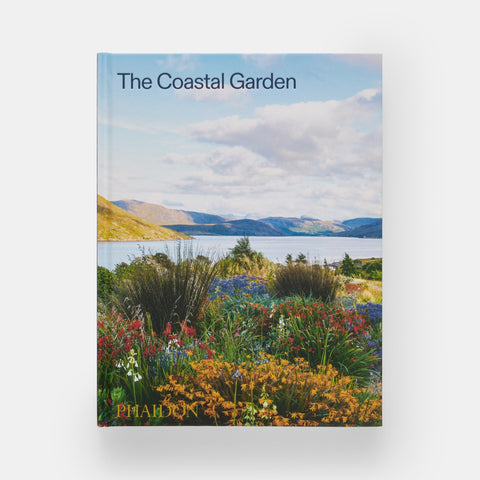 The Coastal Garden book by Phaidon featuring a vibrant wildflower garden overlooking a coastal bay
