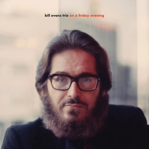 Bill Evans wearing glasses with a bear on the cover of this album